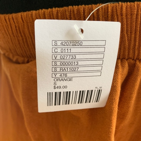 NWT eeote Burnt Orange Strapless Flowy Top - Picture 5 of 7